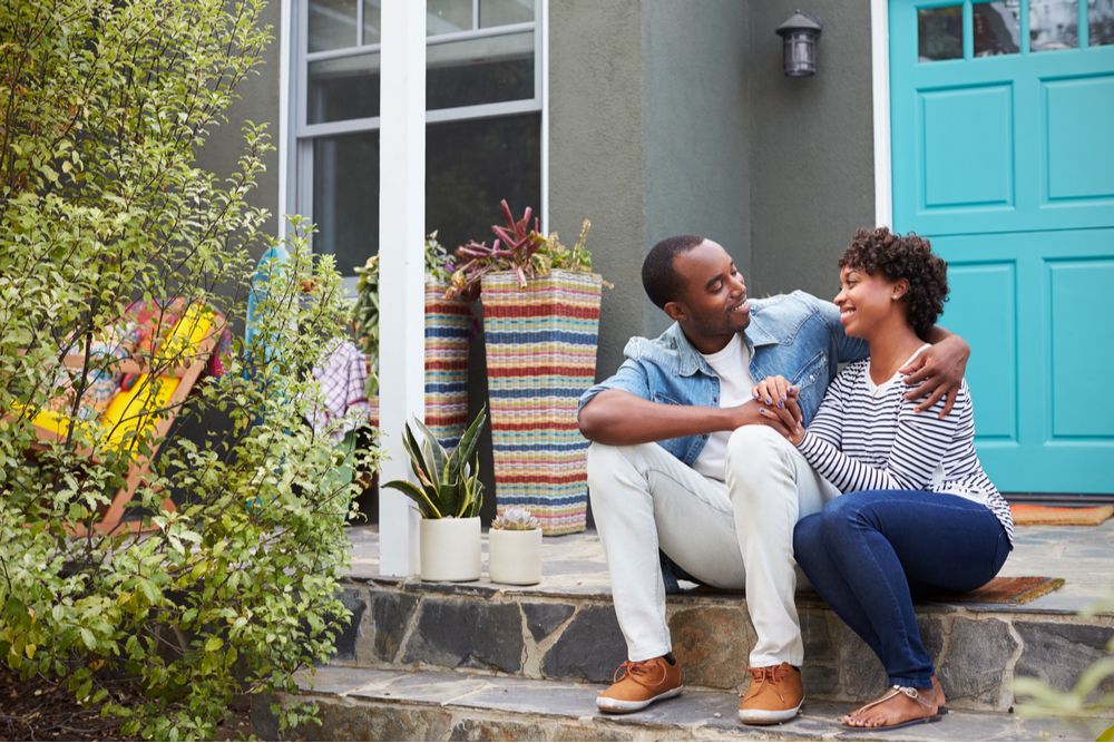 Couple sitting on front porch